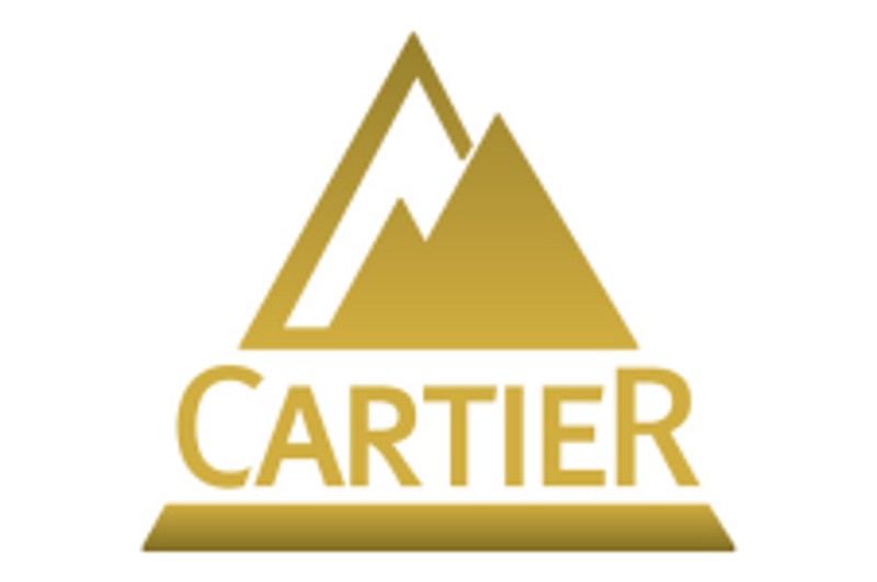 Investor Insight                                
Cartier Resources presents a compelling gold investment opportunity, driven by a growing Abitibi resource, solid institutional support, and upcoming development milestones.
                            Overview                                
Cartier Resources (TSXV:ECR,FSE:6CA) is a Quebec-based gold exploration company advancing a compelling growth story anchored in one of Canada’s most prolific gold regions — the Abitibi Greenstone Belt. With a focused strategy, institutional support and a commitment to innovation, Cartier is building a significant gold resource base while positioning its flagship Cadillac project as an emerging mining camp east of Val-d’Or. As the company transitions from explorer to potential developer, the coming months present multiple catalysts for a significant valuation uplift.
<em><em>Cartier projects in the Abitibi Greenstone Belt in Quebec</em></em>
The Cadillac project has evolved from a single mine project into an emerging gold camp with multiple deposits, advanced resource modeling, and a clear development path. Located in a mining-friendly jurisdiction with existing infrastructure, the Cadillac project is ideally positioned to attract development partners, strategic investments, or acquisition interest from senior producers.
In 2023, using a gold price of US$1,750, Cartier completed a preliminary economic assessment (PEA) which confirmed the project’s robust economics, with a production forecast of 116,900 oz/year over 9.7 years and a low AISC of US$755/oz. 
With permitting pathways de-risked by historical mining activity and extensive drilling already completed, Cartier has launched a fully funded 100,000-metre diamond drilling program. By combining AI and geostatistical reinterpretation techniques with traditional exploration methods, the company is positioning itself at the forefront of modern mineral discovery.
The Cadillac project has all the hallmarks of a high-potential development-stage gold asset: grade, scale, jurisdiction, infrastructure, and strategic backing. Cartier is also actively pursuing parallel value-creation opportunities, including the reprocessing of legacy tailings at the Chimo site and monetization of non-core assets like Wilson, Fenton and Benoist.
                            Company Highlights                                
<strong>District-Scale Gold Project: Cadillac: </strong>Cartier’s core asset consolidates the former Chimo Mine and East Cadillac properties into a district-scale land package on the prolific Larder Lake-Cadillac Fault — host to more than 100 million ounces of historic gold production.
Aggressive Exploration Program: In 2025, Cartier launched a 100,000-meter drill program — one of the largest in the region — to expand its substantial gold resources and unlock Cadillac’s camp-scale potential<strong>.</strong>
<strong>Innovation in Discovery: </strong>The company is leveraging AI-assisted mineral discovery tools, in partnership with VRIFY, to sharpen drill targeting and accelerate new discoveries<strong>.</strong>
<strong>Strategic Partnership with Agnico Eagle: </strong>Agnico Eagle, Cartier’s largest shareholder with a 28 percent equity stake, provides financial strength and validates the company’s assets and strategy<strong>.</strong>
<strong>ESG-Friendly Tailings Reprocessing: </strong>Cartier has introduced a low-capex initiative to evaluate reprocessing 600,000 tons of historic tailings, representing a potential near-term revenue stream with ESG benefits<strong>.</strong>
<strong>Attractive Valuation </strong>With a clean share structure and a market cap of C$52.9 million, Cartier offers significant re-rating potential as exploration and development catalysts unfold.
                            Key Projects                                
Cadillac Project
The company’s flagship Cadillac project is a consolidated land package totaling 11,525 hectares, located along a 15-kilometre strike of the Larder Lake–Cadillac Fault (LLCF) — one of the most productive gold-bearing structures in Canada. This fault zone has historically produced over 100 million ounces of gold across multiple camps. Cartier’s land package includes the past-producing Chimo Mine (379,012 oz gold from 1964 to 1997), West Nordeau, and several new discovery zones over a 10-km strike length straddling the LLCF.
Cartier has completed four mineral resource estimates (MREs) between 2019 and 2022. The most recent, published in May 2023, outlined 7.1 million tons (Mt) @ 3.1 grams per ton (g/t) gold (720,000 oz) indicated and 18.5 Mt @ 2.8 g/t gold (1.63 Moz) inferred. The PEA evaluated an underground mining operation fed from three primary zones (Chimo, East Chimo, West Nordeau), with a 2.9-year payback on a C$341 million capex. The PEA assumes an average head grade of 3.0 g/t gold and annual production of 116,900 oz gold. Infrastructure advantages include an existing shaft, power line and permitted tailings facility.
Cartier Resources has commenced its fully funded 100,000-metre drill program at the Cadillac Project in Quebec, the largest ever on the property. The 18-month campaign is designed to both expand known gold zones and test new high-priority targets along the Cadillac Fault Zone. With $11 million in cash and no debt, Cartier is well positioned to advance Cadillac’s district-scale gold potential.
Chimo Tailings Project
As part of Cartier’s sustainability-focused development strategy, the company is evaluating the potential for reprocessing approximately 600,000 tons of historical tailings deposited during the Chimo Mine operations. This project could unlock near-term, low-cost production with a minimal environmental footprint. Cartier will launch metallurgical characterization to assess gold recovery potential and economic viability. The project benefits from proximity to several underutilized gold mills in the Val-d’Or region, potentially enabling toll milling agreements.
<em><em>Other Projects: Wilson, Fenton and Benoist</em></em>
Cartier also holds 100 percent ownership of three additional gold projects — Wilson, Fenton and Benoist — all located within the Abitibi Belt and each hosting historical gold mineralization or compliant resources. The Wilson Project (1,750 ha, three zones), Fenton (671 ha, 12 zones) and Benoist (3,086 ha, two zones) are currently available for joint ventures or sale. These assets offer significant exploration upside and optionality, allowing Cartier to remain focused on Cadillac while preserving long-term value.
                            Management Team                                
Philippe Cloutier – Founder, President, CEO and Director
Philippe Cloutier is the founder and driving force behind Cartier Resources. A professional geologist with over 35 years of experience in the exploration and development of precious and base metal deposits, Cloutier has a deep technical understanding of the Abitibi Greenstone Belt, having spent most of his career advancing projects in this prolific region.
Nancy Lacoursière – Chief Financial Officer
Nancy Lacoursière brings over 20 years of experience in corporate finance, accounting and strategic financial management. She has held CFO and senior finance positions across the natural resources and manufacturing sectors, with a strong focus on Quebec-based operations.
Ronan Déroff – VP of Exploration
Ronan Déroff is a senior exploration geologist and Cartier’s designated qualified person under NI 43-101. With over 15 years of experience in mineral exploration, resource modeling, GIS and project management, Déroff leads the technical execution of Cartier’s exploration strategy. He has overseen the development of multiple MREs and PEAs for the Cadillac project, and played a central role in integrating modern data analysis and AI-assisted targeting into the company’s workflow. He holds a Masters in operations and management of mineral resources (EGERM), from the Université d’Orléans (France).
This post appeared first on investingnews.com Cartier Resources